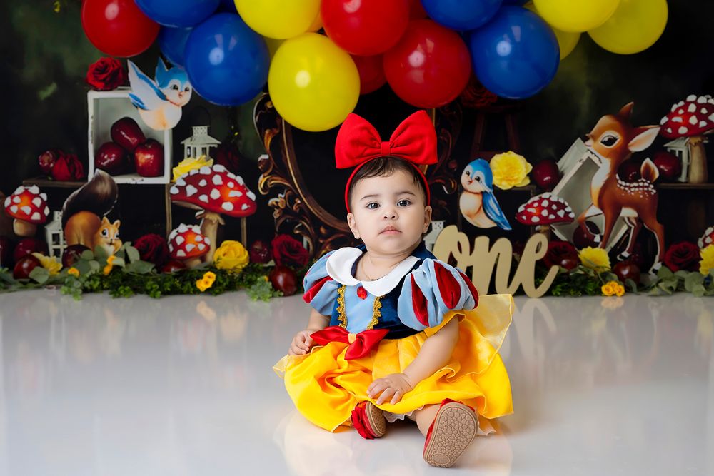 Happy one-year-old during a cake smash session